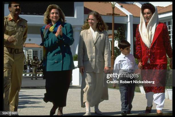 1st Lady Hillary Rodham Clinton & daughter Chelsea out strolling w. PM Benazir Bhutto & children Benazir & Bilawal, on Asian tour stop in Islamabad,...