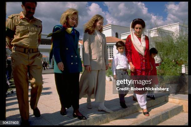 1st Lady Hillary Rodham Clinton & daughter Chelsea out strolling w. PM Benazir Bhutto & children Benazir & Bilawal, on Asian tour stop in Islamabad,...
