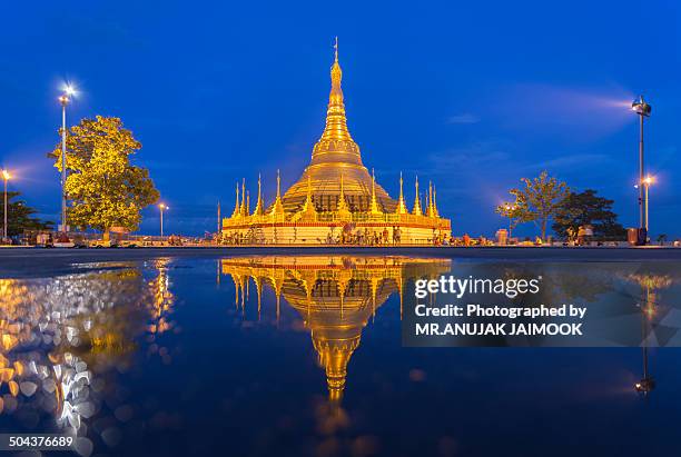 the reflection of shwedagon pagoda, myanmar - shwedagon pagoda stock pictures, royalty-free photos & images