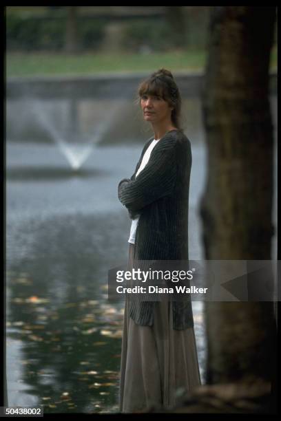 Author Anne Tyler in sylvan setting , prob. At home.