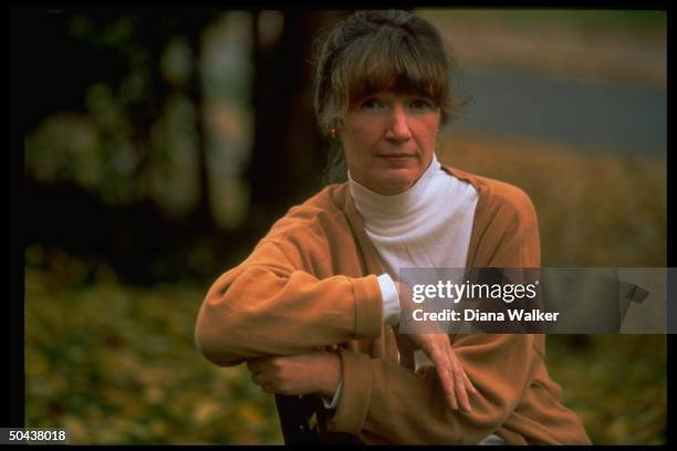 Author Anne Tyler in sylvan setting , prob. At home.