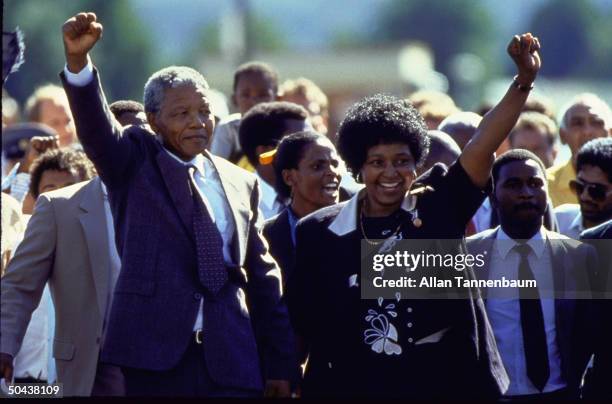 Ldr. Nelson Mandela and wife Winnie raising fists upon his release from Victor Verster prison after 27 yrs.