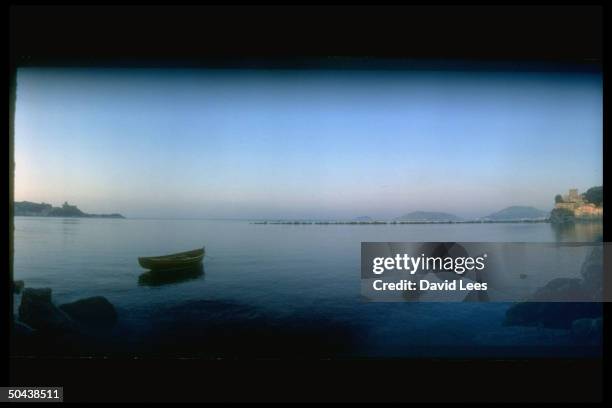 Small boat floating in the Bay of Lerici, opposite home of British poet Percy Bysshe Shelley.