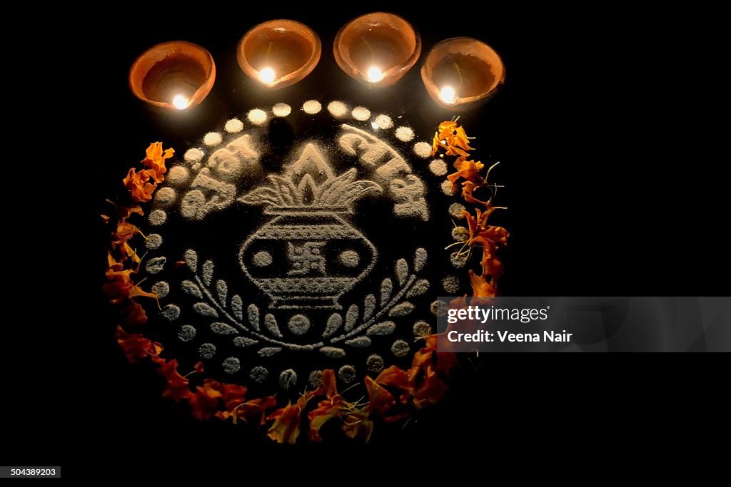 Deepavali diyas with rangoli