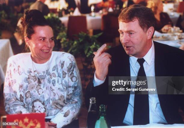 Vladimir & Galina Zhirinovsky celebrating his winning seat in Duma, taking quiet moment together during party feeling strong showing of his...