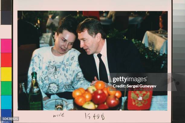 Vladimir & Galina Zhirinovsky celebrating his winning seat in Duma, taking quiet moment together during party feeling strong showing of his...