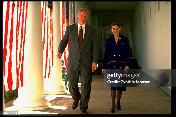 Pres. Bill Clinton strolling WH colonnade w. Supreme Court Justice nominee Ruth Bader Ginsburg.