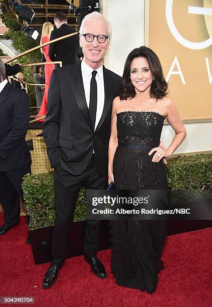 73rd ANNUAL GOLDEN GLOBE AWARDS -- Pictured: Actor Brad Hall and actress Julia Louis-Dreyfus arrive to the 73rd Annual Golden Globe Awards held at...