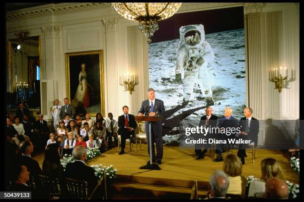 Ceremony in the East Room of the White House for Apollo 11 astronauts on 25th moon landing anniv.: VP Gore, Pres. Clinton, Neil Armstrong, Buzz...