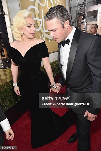 73rd ANNUAL GOLDEN GLOBE AWARDS -- Pictured: Actress/recording artist Lady Gaga and actor Taylor Kinney arrive to the 73rd Annual Golden Globe Awards...