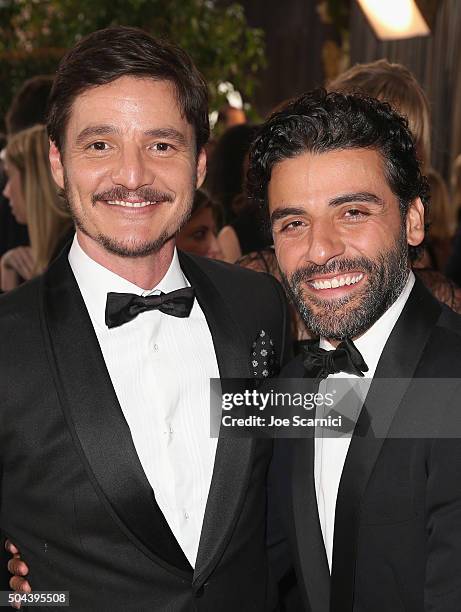 Actors Pedro Pascal and Oscar Isaac attend the 73rd Annual Golden Globe Awards held at the Beverly Hilton Hotel on January 10, 2016 in Beverly Hills,...