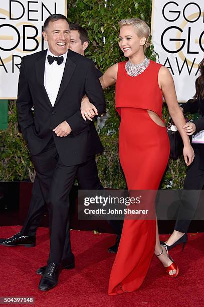 Director David O. Russell and actress Jennifer Lawrence attend the 73rd Annual Golden Globe Awards held at the Beverly Hilton Hotel on January 10,...