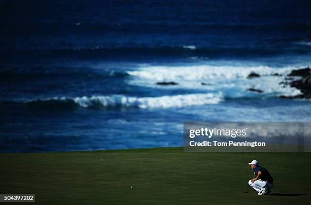 Jordan Spieth lines up a putt on the 11th green during the final round of the Hyundai Tournament of Champions at the Plantation Course at Kapalua...