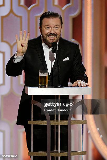 In this handout photo provided by NBCUniversal, Host Ricky Gervais speaks onstage during the 73rd Annual Golden Globe Awards at The Beverly Hilton...