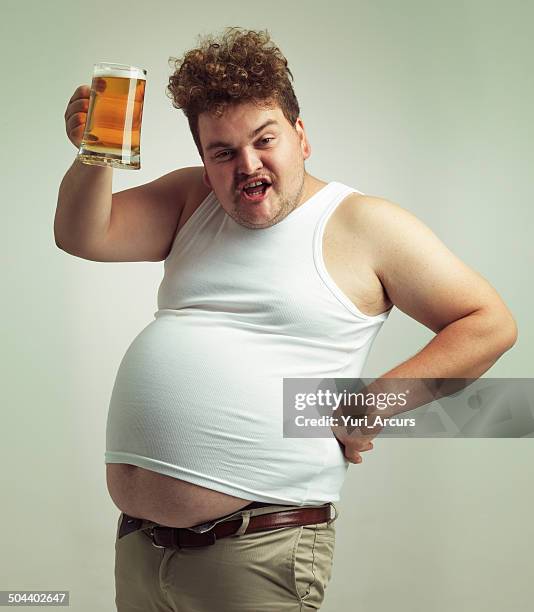 ¡salud! - hombre gordo fotografías e imágenes de stock