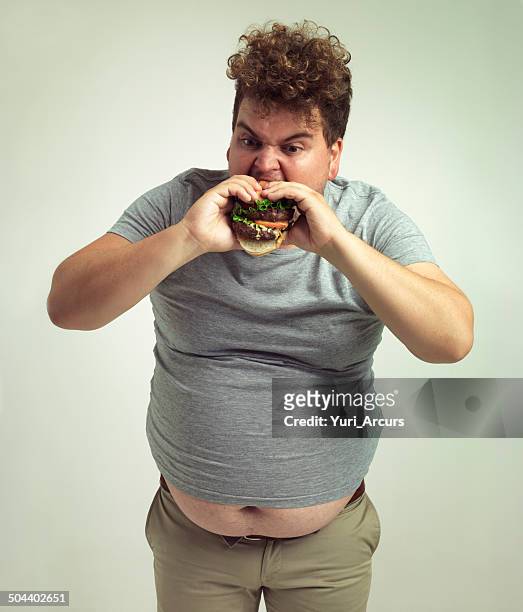 this is the best burger ever! - man holding a burger stock pictures, royalty-free photos & images
