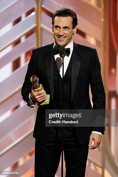 In this handout photo provided by NBCUniversal, Jon Hamm accepts the award for Best Actor - TV Series, Drama "Mad Men" onstage during the 73rd Annual...