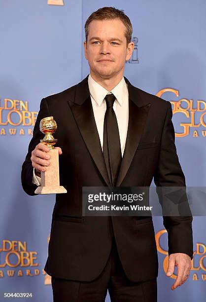Actor Matt Damon, winner of Best Performance in a Motion Picture - Musical or Comedy for 'The Martian,' poses in the press room during the 73rd...
