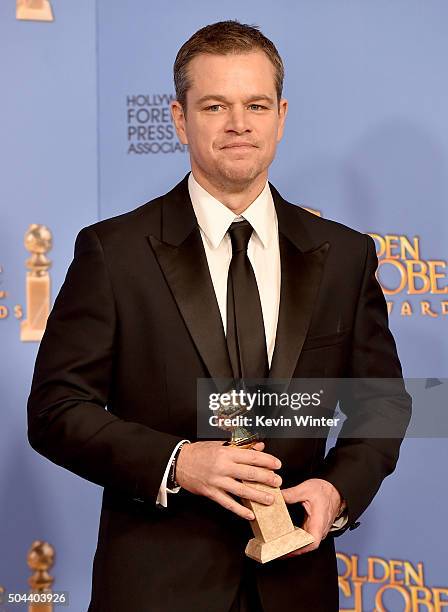 Actor Matt Damon, winner of Best Performance in a Motion Picture - Musical or Comedy for 'The Martian,' poses in the press room during the 73rd...