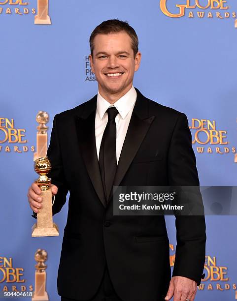 Actor Matt Damon, winner of Best Performance in a Motion Picture - Musical or Comedy for 'The Martian,' poses in the press room during the 73rd...