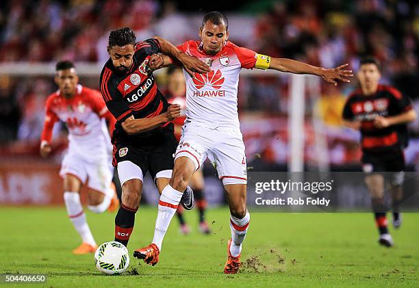 Karim Bellarabi of the Bayer Leverkusen in action against Sergio Otlvaro of the Indepediente Santa Fe during the match at the ESPN Wide World of...