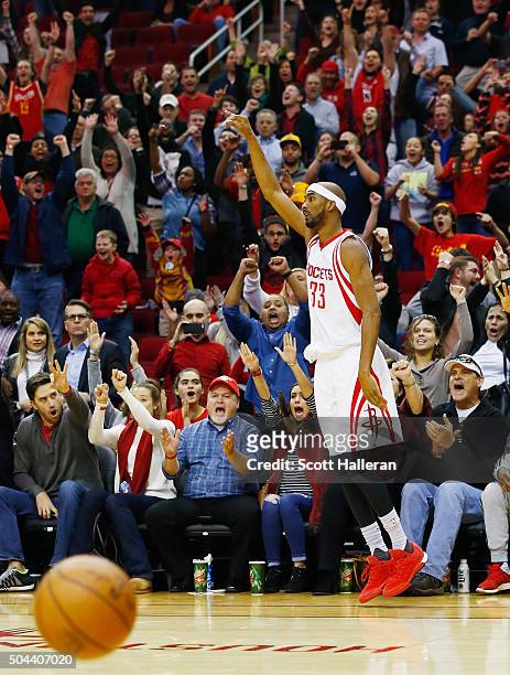 Corey Brewer of the Houston Rockets celebrates a three-point shot against the Indiana Pacers in overtime during their game at the Toyota Center on...