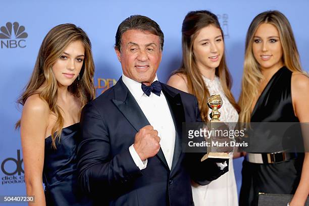 Actor Sylvester Stallone , winner of Best Supporting Performance in a Motion Picture for 'Creed,' poses in the press room with daughters Sistine,...