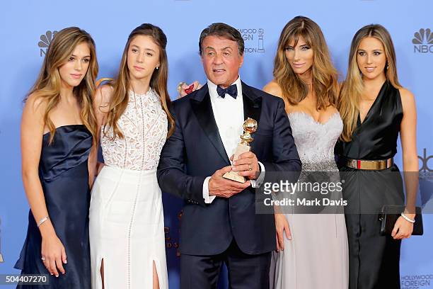 Actor Sylvester Stallone , winner of Best Supporting Performance in a Motion Picture for 'Creed,' poses in the press room with wife Jennifer Flavin...