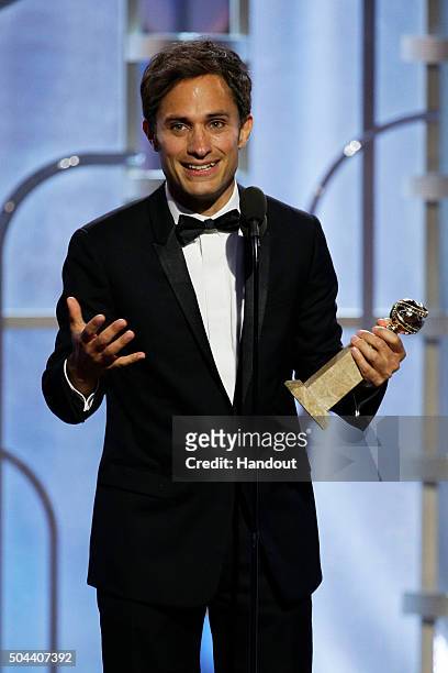 In this handout photo provided by NBCUniversal, Gael Garcia Bernal accepts the award for Best Actor - TV Series, Comedy for "Mozart in the Jungle"...