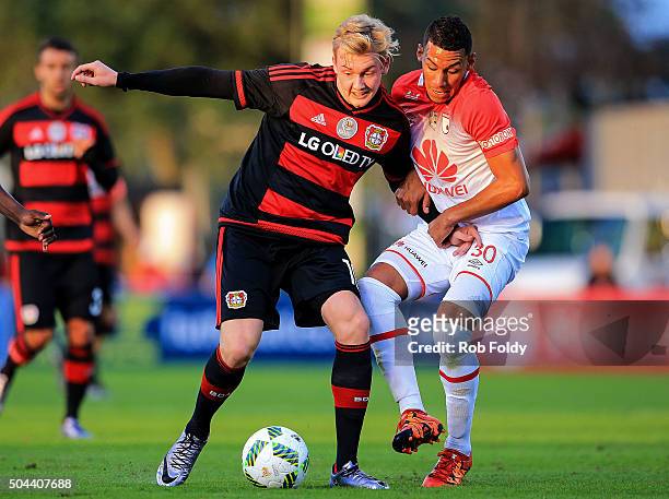 Julian Brandt of the Bayer Leverkusen in action against Yeison Gordillo of the Indepediente Santa Fe during the match at the ESPN Wide World of...