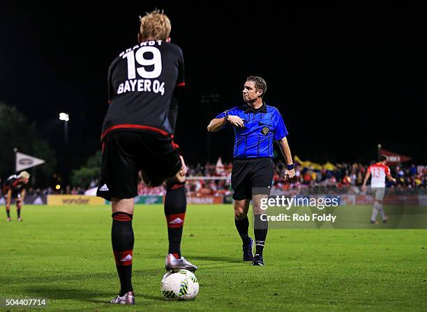 Julian Brandt waits to resume play after Sebastin Salazar of the Indepediente Santa Fe was ejected with a red card during the match against Bayer...