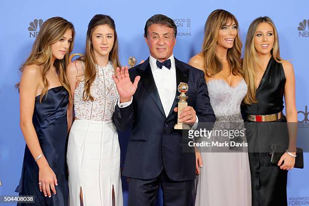 Actor Sylvester Stallone , winner of Best Supporting Performance in a Motion Picture for 'Creed,' poses in the press room with wife Jennifer Flavin...