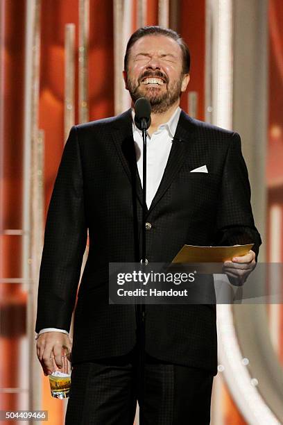 In this handout photo provided by NBCUniversal, Host Ricky Gervais speaks onstage during the 73rd Annual Golden Globe Awards at The Beverly Hilton...
