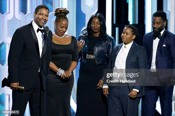 In this handout photo provided by NBCUniversal, Denzel Washington accepts with Cecil B. Demille Award with his family during the 73rd Annual Golden...