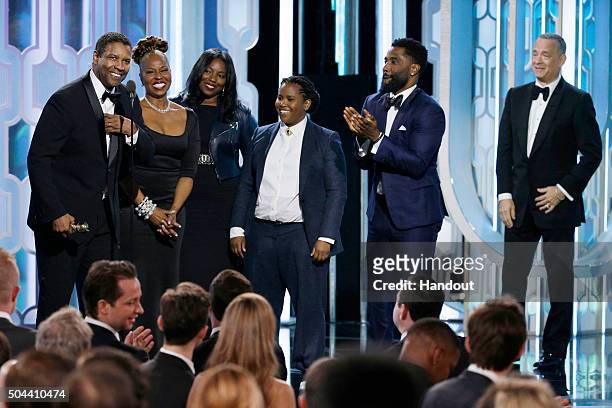 In this handout photo provided by NBCUniversal, Denzel Washington accepts with Cecil B. Demille Award with his family during the 73rd Annual Golden...