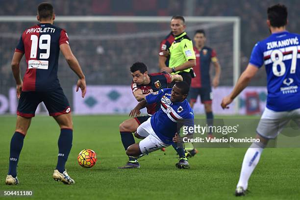 Blerin Dzemaili of Genoa CFC is tackled by Lucas Martins Fernando of UC Sampdoria during the Serie A match between Genoa CFC and UC Sampdoria at...