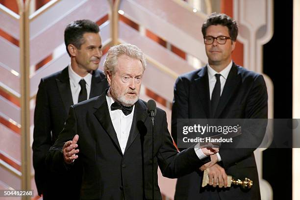 In this handout photo provided by NBCUniversal, Ridley Scott accepts the award for Best Motion Picture - Comedy for "The Martian" during the 73rd...