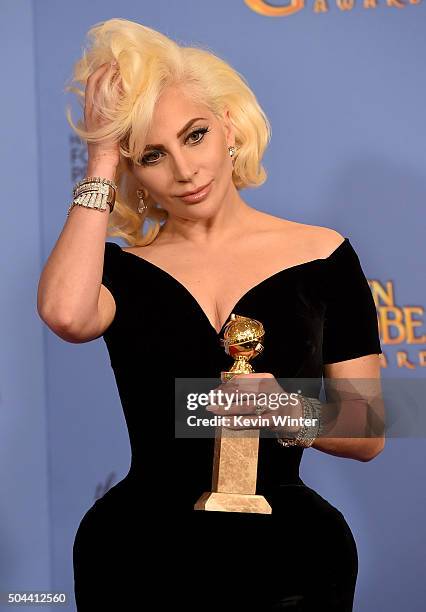 Actress/singer Lady Gaga, winner of Best Performance in a Miniseries or Television Film for 'American Horror Story: Hotel,' poses in the press room...