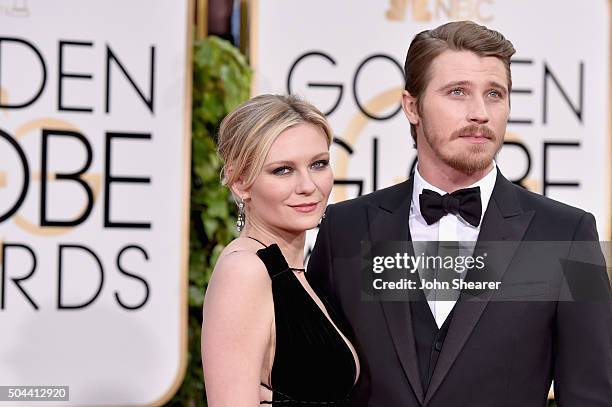 Actress Kirsten Dunst and actor Garrett Hedlund attends the 73rd Annual Golden Globe Awards held at the Beverly Hilton Hotel on January 10, 2016 in...