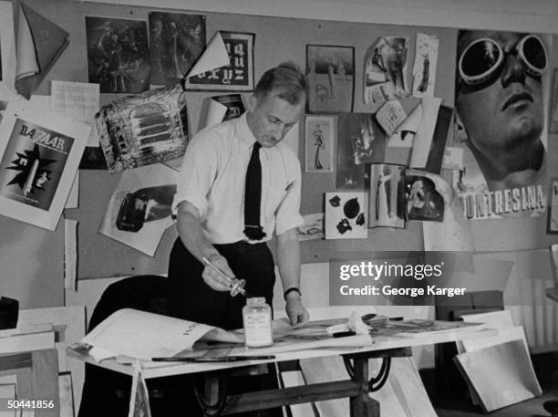 Art director Alexey Brodovitch working on a Paris fashion layout.