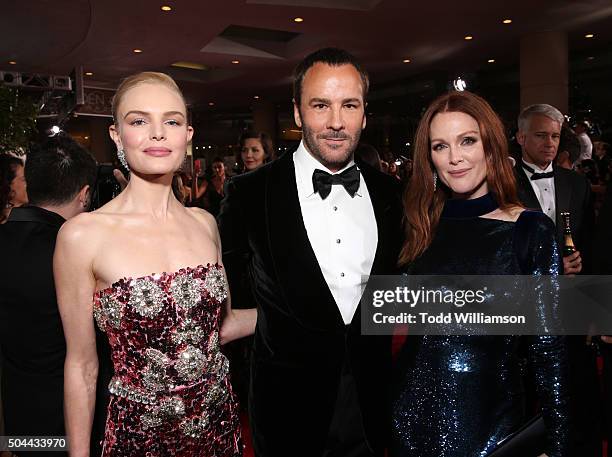 Actress Kate Bosworth, designer Tom Ford and actress Julianne Moore attend the 73rd Annual Golden Globe Awards at The Beverly Hilton Hotel on January...