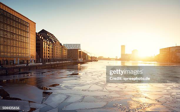 berlin cityscape with frozen spree river - berlin ufer stock-fotos und bilder