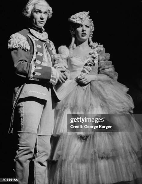 Actress/dancer Betty Grable as a court of Versailles cortesan w. Unident. Male actor during Broadway performance of new musical Du Barry Was a Lady.