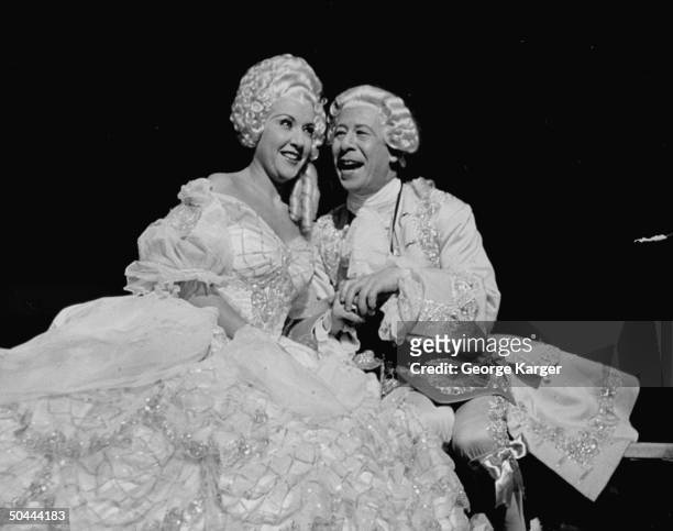 Actor Bert Lahr as Louix XV, moving in on actress Ethel Merman, as Madame Du Barry, his mistress who is bent on rebuffing his advances in the...