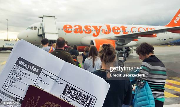 boarding an easyjet flight - easyjet stock pictures, royalty-free photos & images