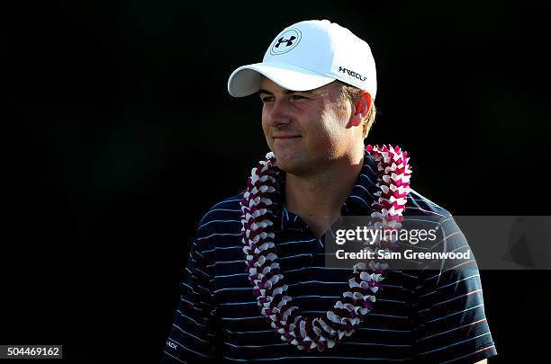 Jordan Spieth celebrates after winning the final round of the Hyundai Tournament of Champions at the Plantation Course at Kapalua Golf Club on...