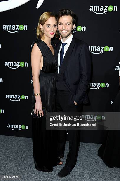 Actors Nora Arnezeder and Guy Burnet attends Amazon Studios Golden Globe Awards Party at The Beverly Hilton Hotel on January 10, 2016 in Beverly...