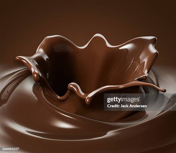 chocolate splash - chocolate swirls stock-fotos und bilder