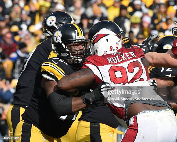 Offensive lineman Marcus Gilbert of the Pittsburgh Steelers blocks defensive lineman Frostee Rucker of the Arizona Cardinals during a game at Heinz...