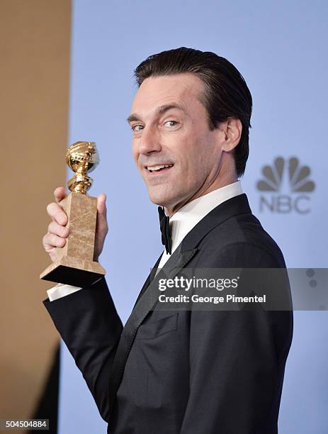 Actor Jon Hamm, winner of the award for Best Performance by an Actor In A Television Series - Drama for 'Mad Men.' poses in the press room during the...